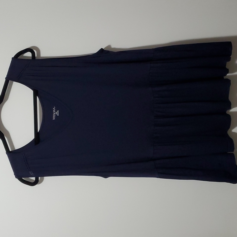 Never worn, navy blue ruffle tank
